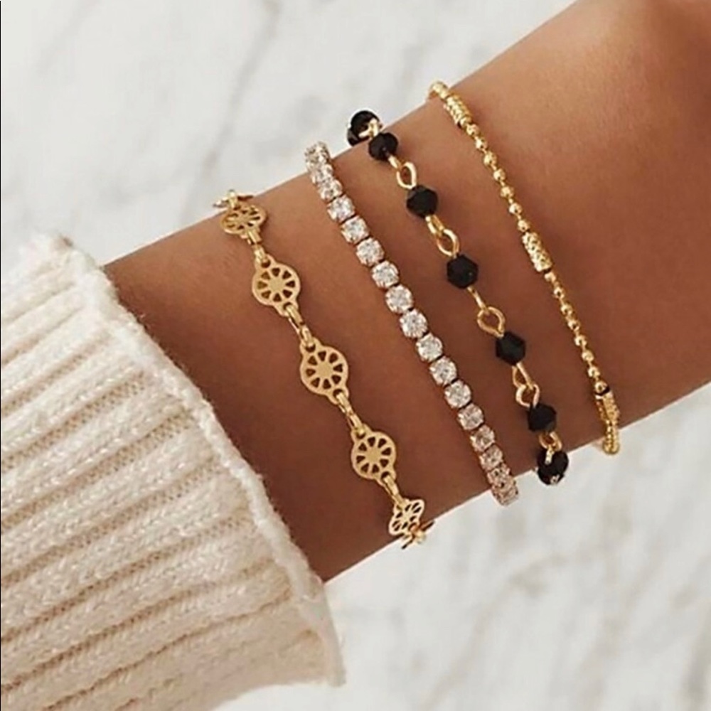 NWT Layered bracelet four piece set rhinestone and Bead detail